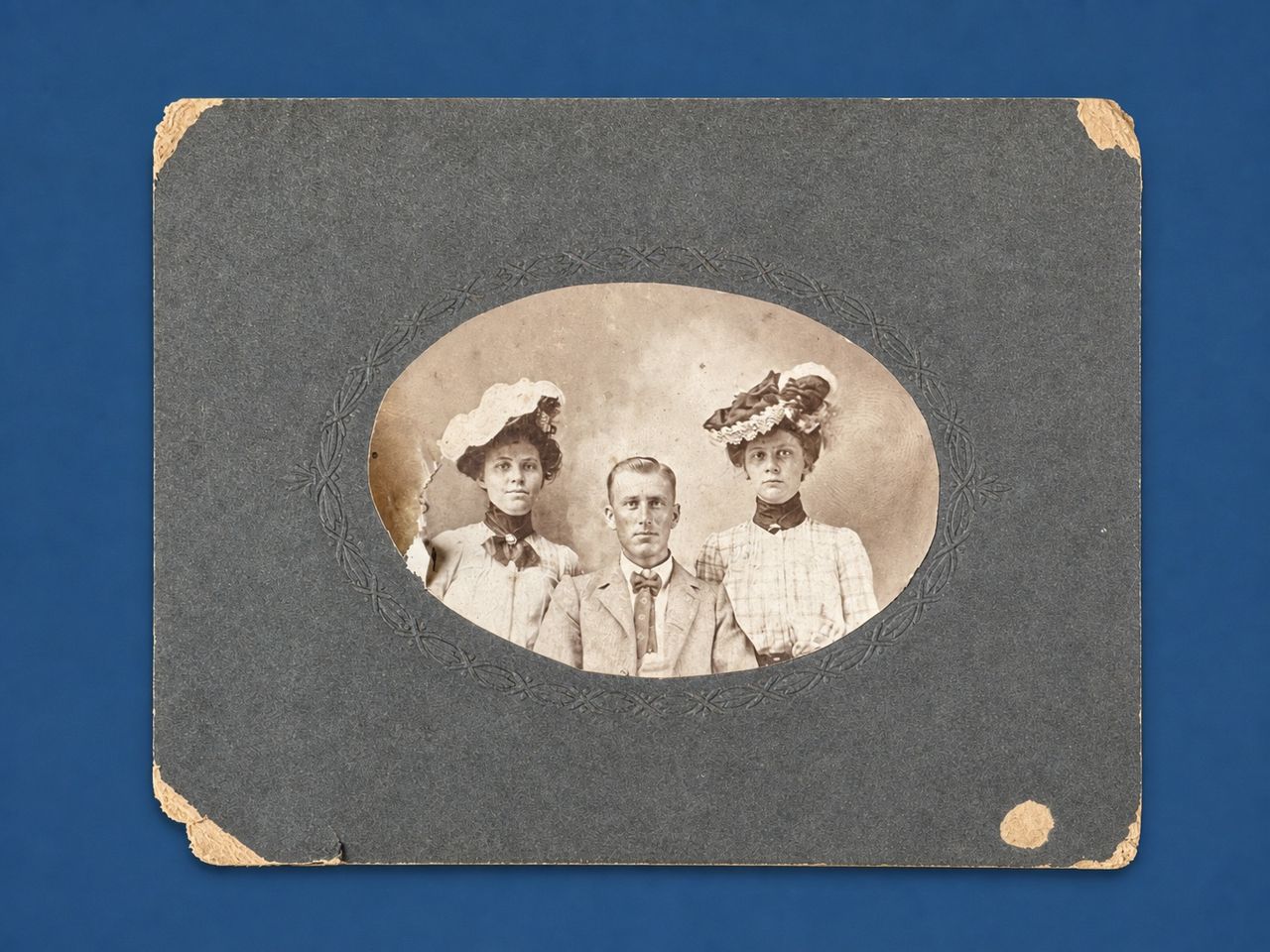 Studio Portrait of Three Unidentified Sitters by Photographer unknown